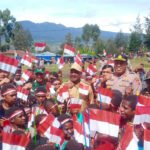 tampak-generasi-muda-papua-saat-memeriahkan-hut-ke-77-ri-di-lyhj